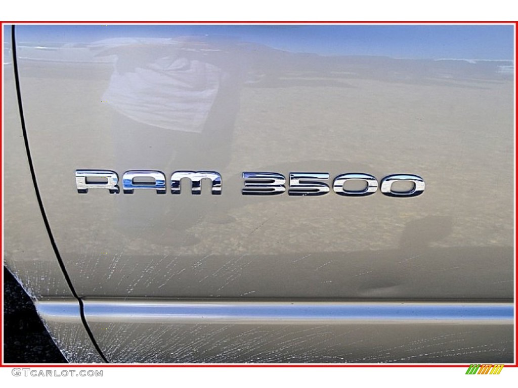 2004 Ram 3500 SLT Quad Cab 4x4 - Light Almond Pearl Metallic / Taupe photo #13