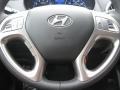 2011 Hyundai Tucson Black Interior Steering Wheel Photo