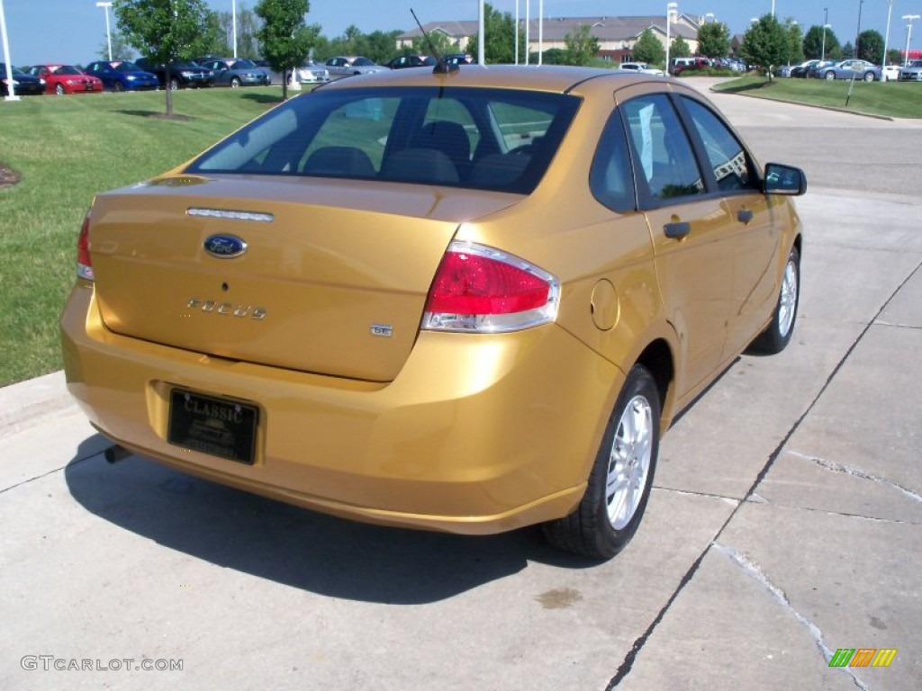 Amber Gold Metallic 2009 Ford Focus SE Sedan Exterior Photo #51832510