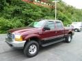 2000 Dark Toreador Red Metallic Ford F250 Super Duty Lariat Crew Cab 4x4  photo #1