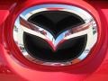 2011 Mazda MAZDA2 Sport Badge and Logo Photo