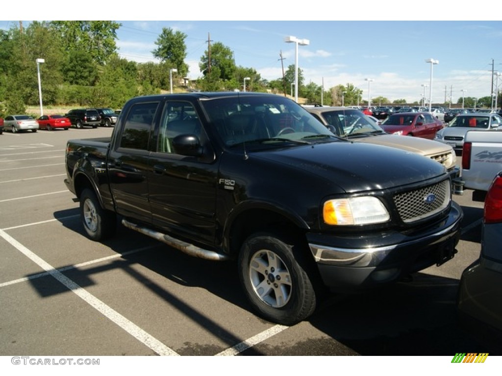 2002 F150 Lariat SuperCrew 4x4 - Black / Medium Graphite photo #1