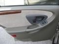 1997 Oldsmobile Cutlass Beige Interior Door Panel Photo