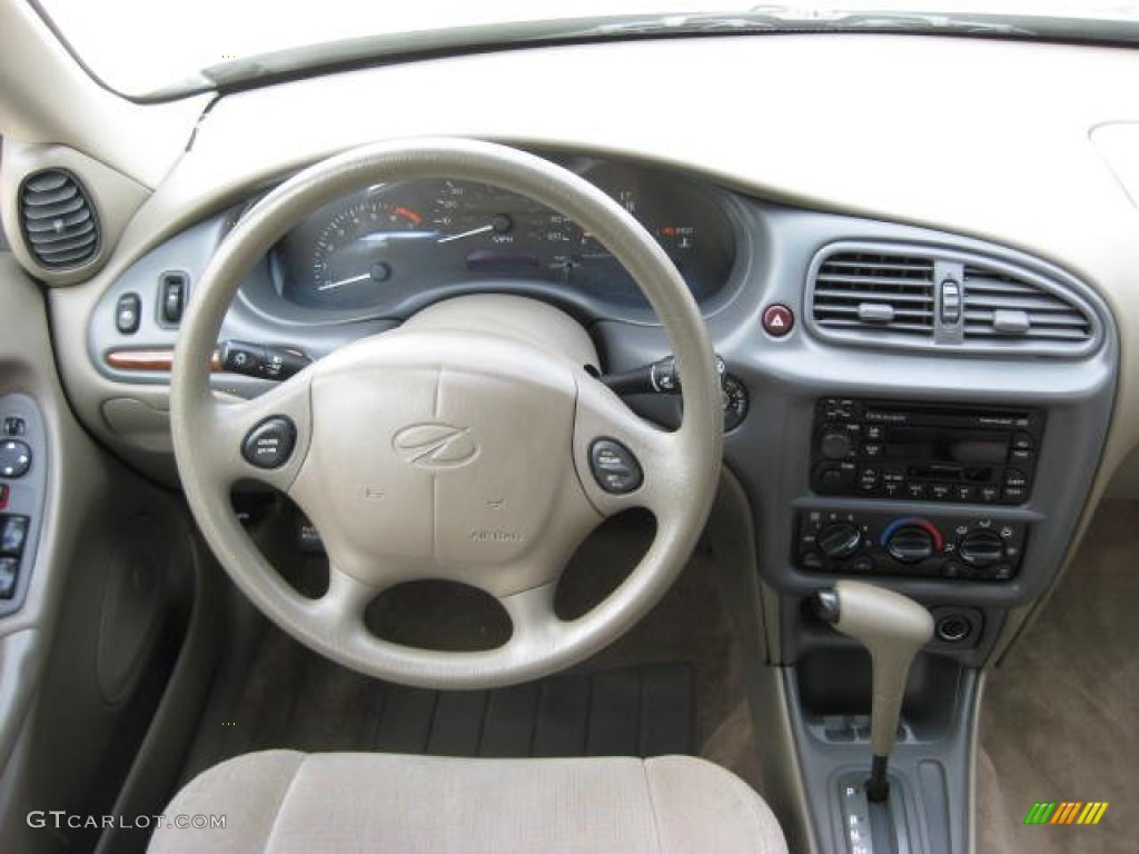 1997 Oldsmobile Cutlass GLS Sedan Beige Dashboard Photo #51850685