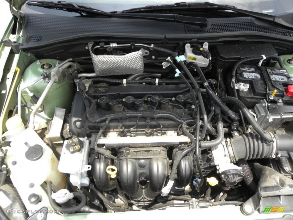 2008 Focus SE Sedan - Kiwi Green / Medium Stone photo #19
