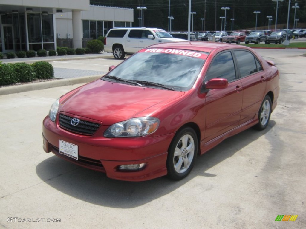 Impulse Red Pearl Toyota Corolla