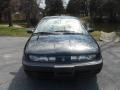 1997 Dark Green Saturn S Series SL1 Sedan  photo #2