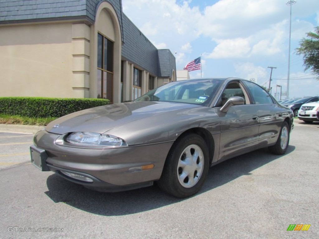 Bronze Mist Metallic 1999 Oldsmobile Aurora Standard Aurora Model Exterior Photo #51899432