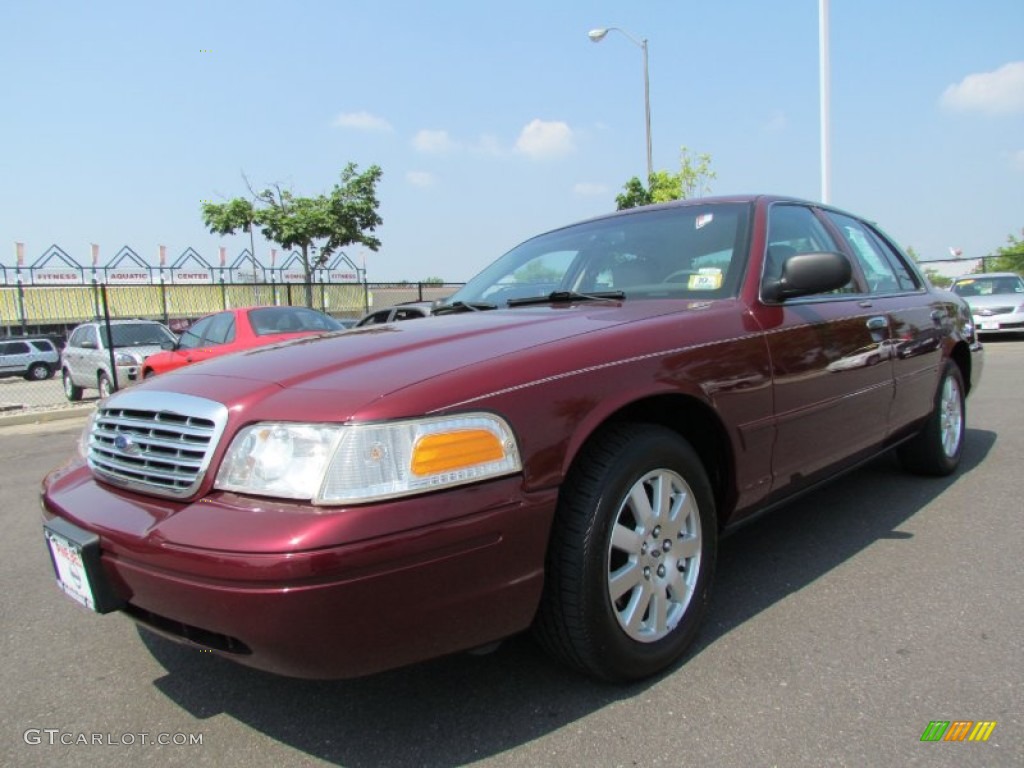 2006 Crown Victoria LX - Dark Toreador Red Metallic / Light Camel photo #1