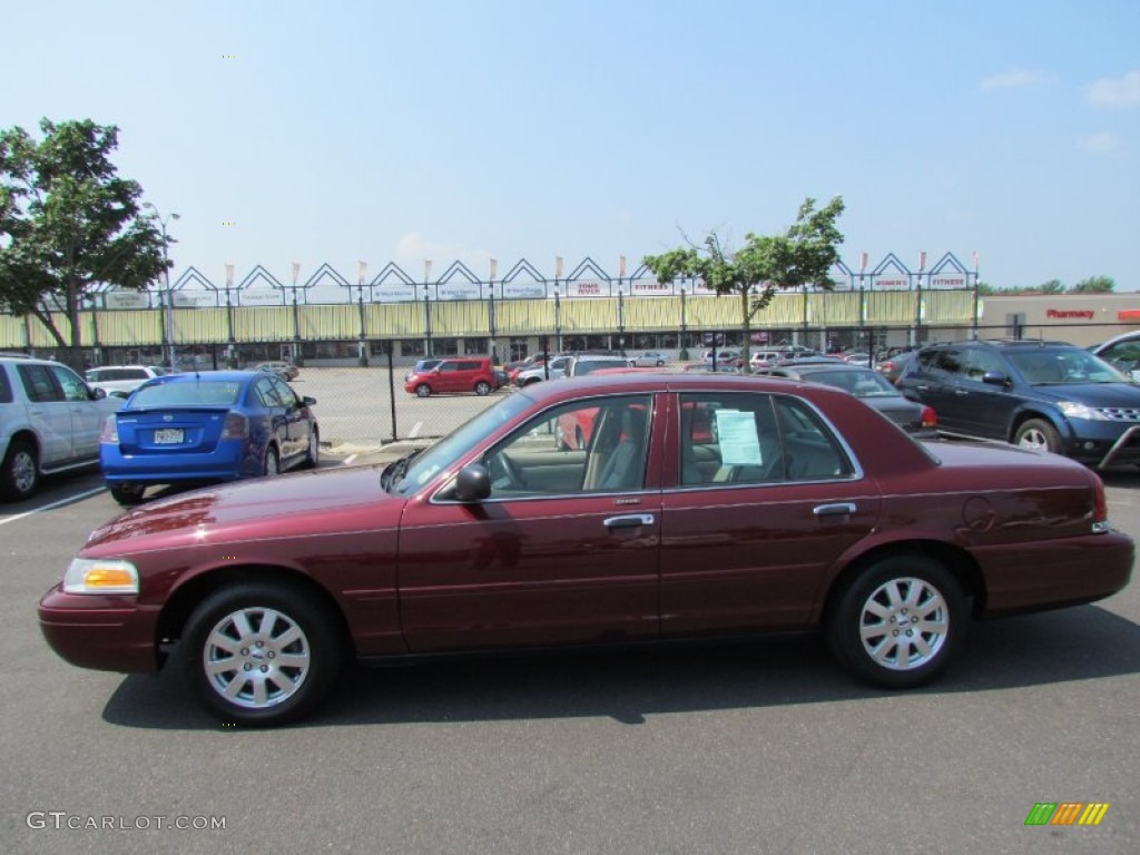Dark Toreador Red Metallic 2006 Ford Crown Victoria LX Exterior Photo #51915596