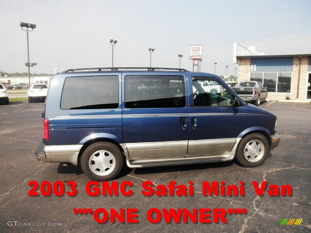 Dark Blue Metallic GMC Safari