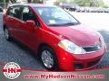 2011 Red Alert Nissan Versa 1.8 S Hatchback  photo #1