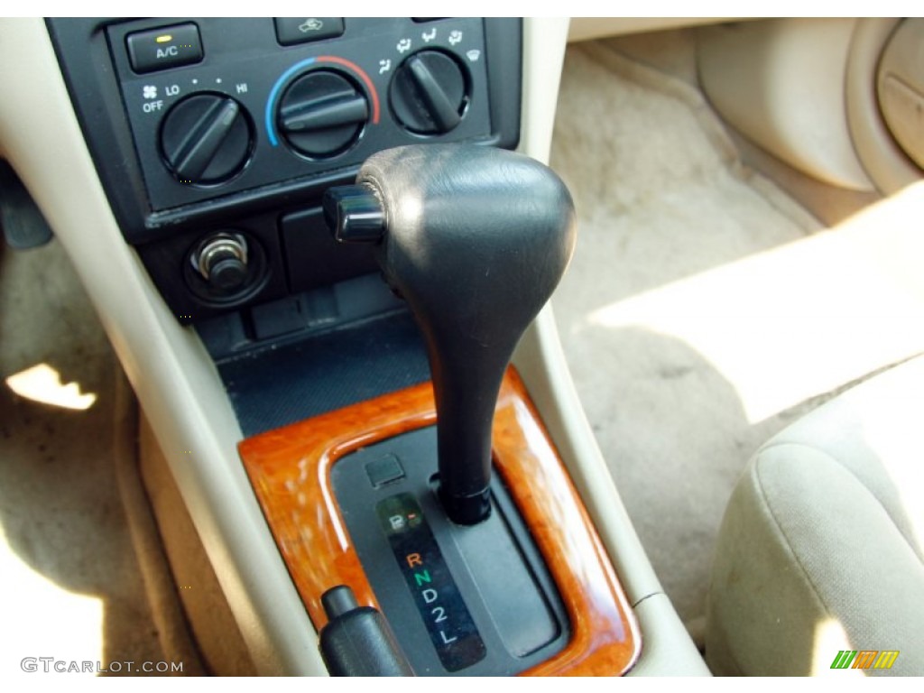 2003 Solara SE V6 Coupe - Red Flame Metallic / Ivory photo #21