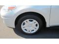 2011 Nissan Versa 1.8 SL Sedan Wheel and Tire Photo