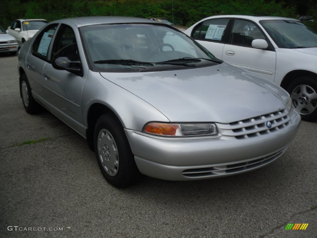 Bright Silver Metallic Plymouth Breeze