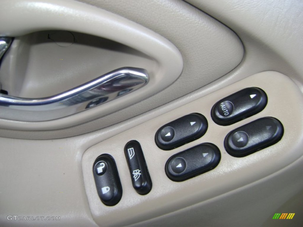 2002 Tribute ES V6 4WD - Chestnut Metallic / Beige photo #10