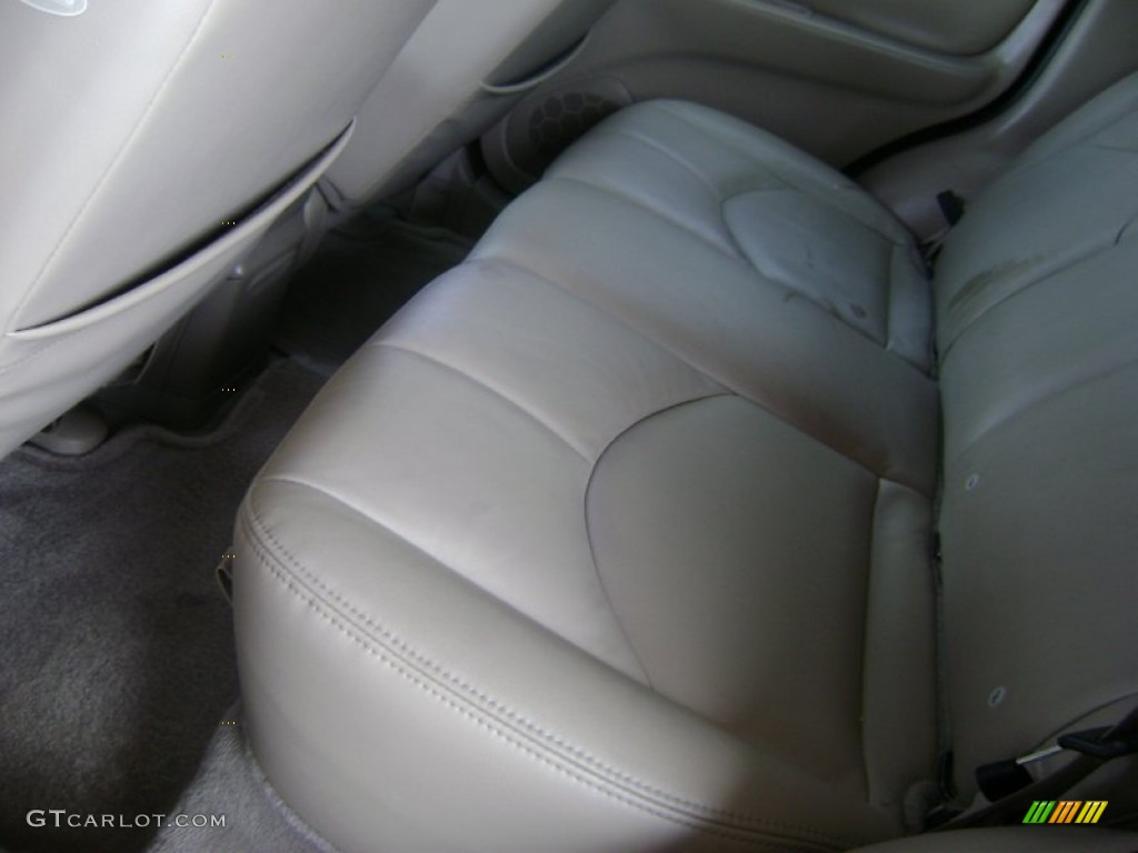 2002 Tribute ES V6 4WD - Chestnut Metallic / Beige photo #15