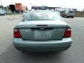 2005 Light Tundra Metallic Ford Focus ZX4 SE Sedan  photo #4