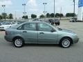2005 Light Tundra Metallic Ford Focus ZX4 SE Sedan  photo #6