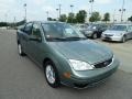 2005 Light Tundra Metallic Ford Focus ZX4 SE Sedan  photo #7