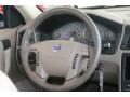2004 Volvo V70 Beige/Light Sand Interior Steering Wheel Photo