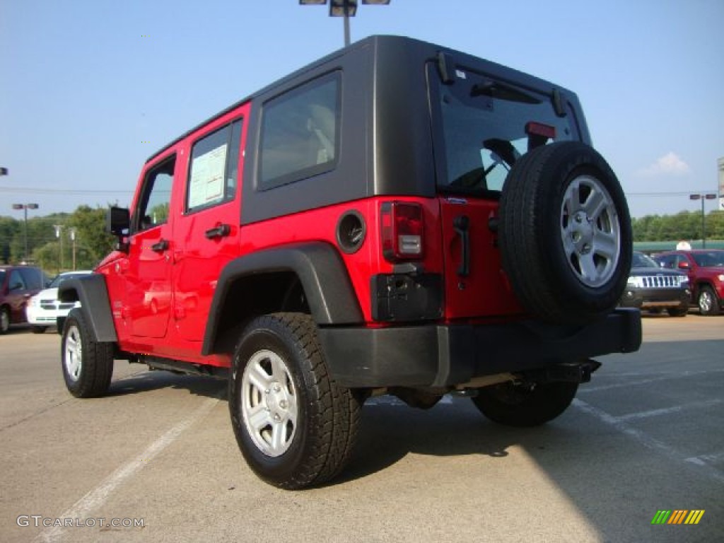 Flame Red 2010 Jeep Wrangler Unlimited Sport 4x4 Right Hand Drive Exterior Photo #52102253