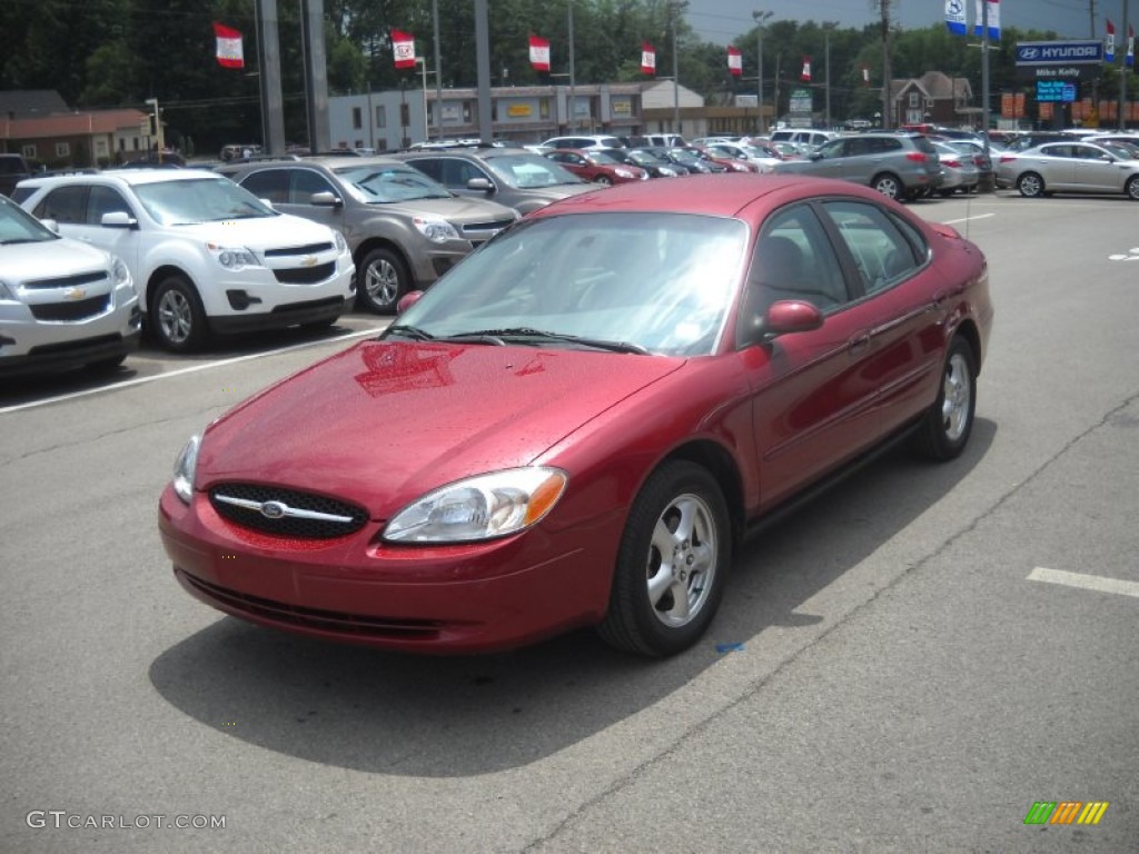 2002 Taurus SE - Matador Red Metallic / Medium Graphite photo #7