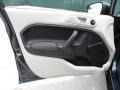 2011 Ford Fiesta Light Stone/Charcoal Black Cloth Interior Door Panel Photo