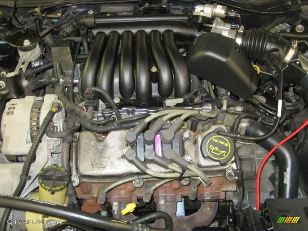2003 Taurus SE - Patriot Blue Metallic / Medium Graphite photo #22
