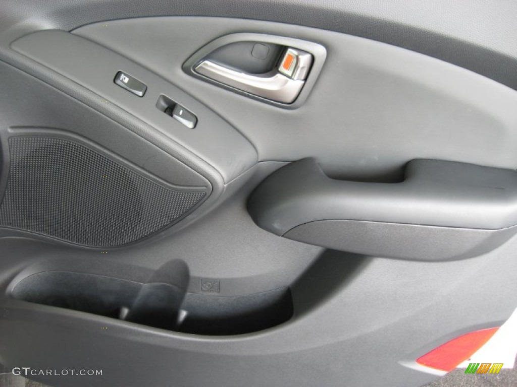 2012 Hyundai Tucson Limited Black/Saddle Door Panel Photo #52156905