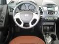 2012 Hyundai Tucson Black/Saddle Interior Dashboard Photo