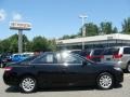 2010 Black Toyota Camry XLE  photo #1