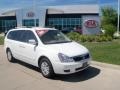 2011 Clear White Kia Sedona LX  photo #1