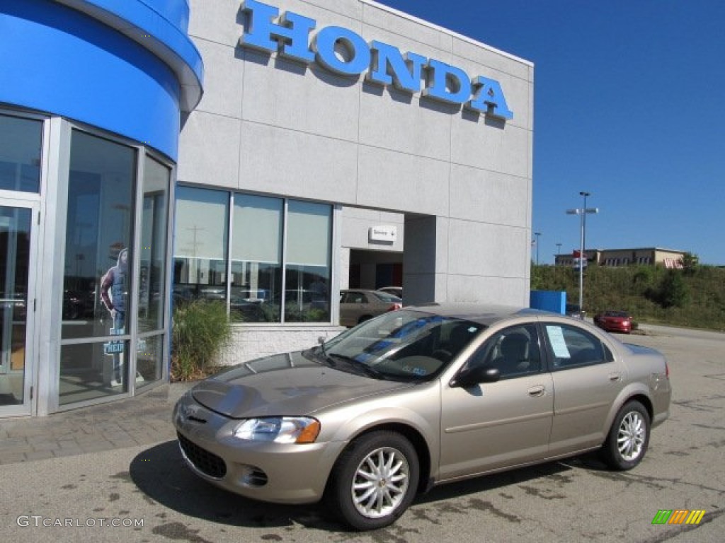 2002 Sebring LX Sedan - Light Almond Pearl Metallic / Sandstone photo #1