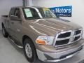 2009 Austin Tan Pearl Dodge Ram 1500 SLT Quad Cab  photo #1