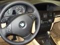 2011 BMW 3 Series Beige Interior Steering Wheel Photo
