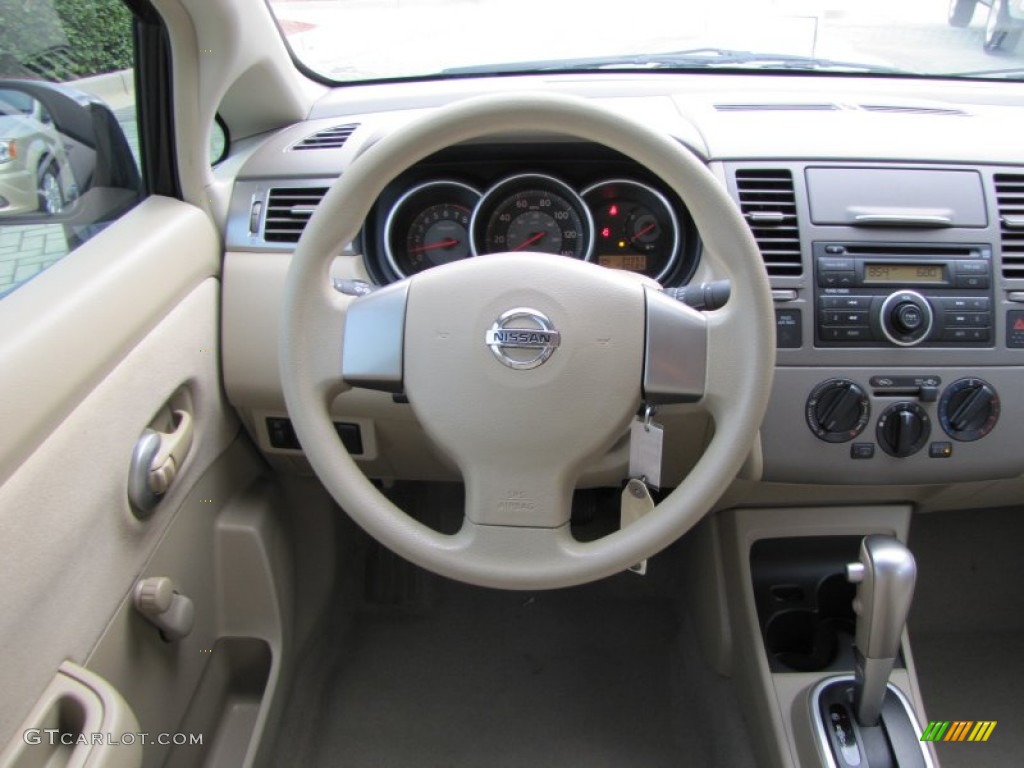 2009 Versa 1.8 S Sedan - Super Black / Beige photo #22