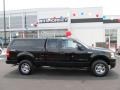 2006 Black Ford F150 STX SuperCab 4x4  photo #2