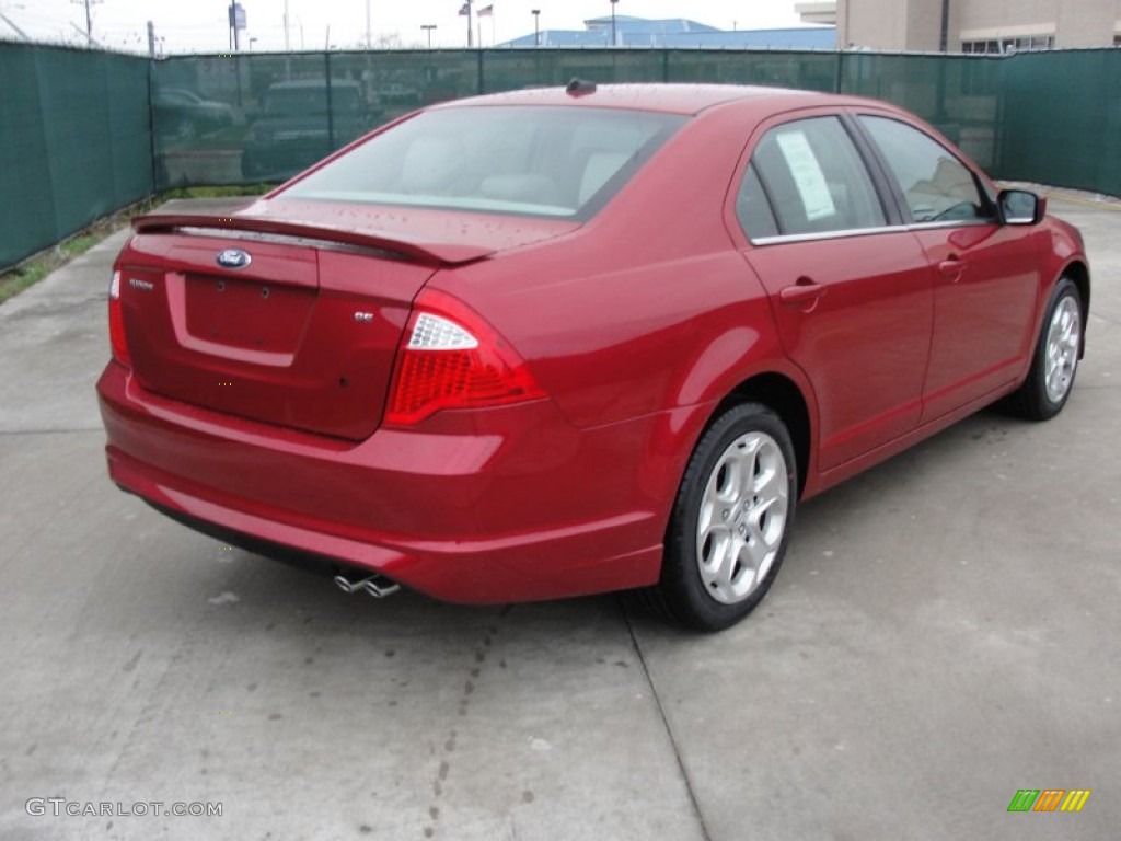 2011 Fusion SE - Red Candy Metallic / Medium Light Stone photo #3