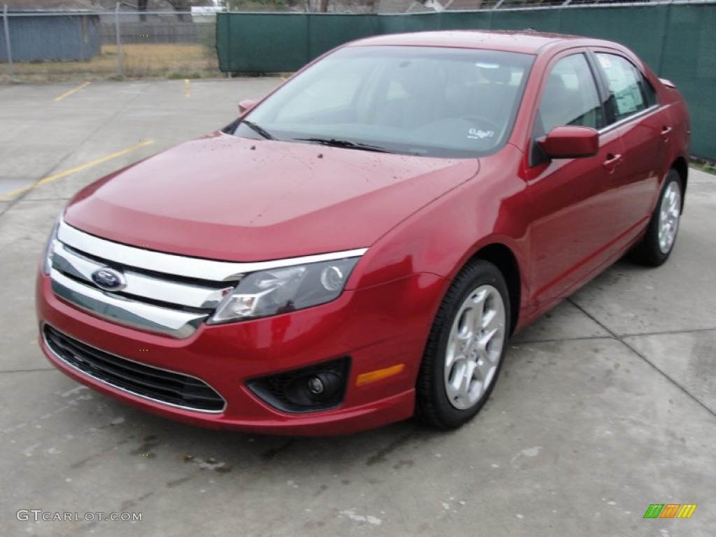 2011 Fusion SE - Red Candy Metallic / Medium Light Stone photo #7