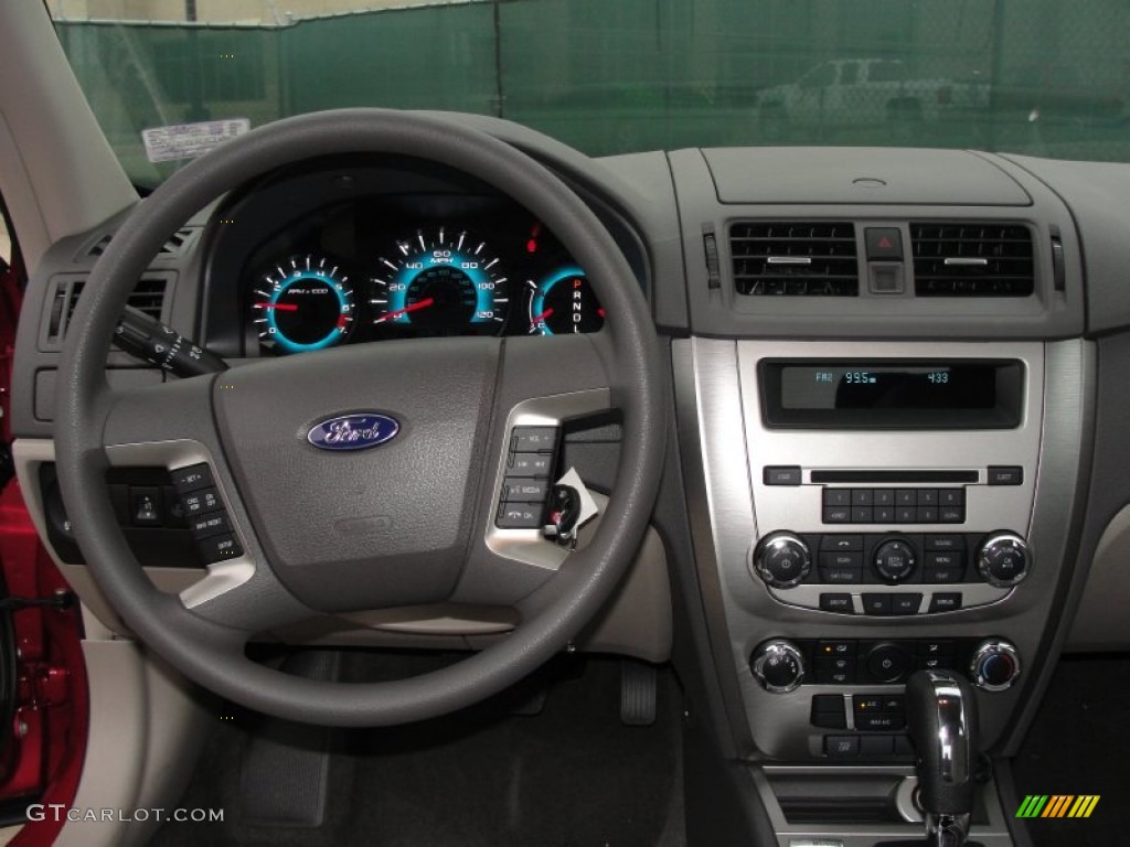 2011 Fusion SE - Red Candy Metallic / Medium Light Stone photo #28