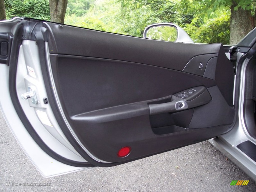2006 Chevrolet Corvette Coupe Ebony Black Door Panel Photo #52326747