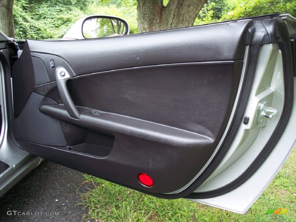 2006 Chevrolet Corvette Coupe Ebony Black Door Panel Photo #52326801