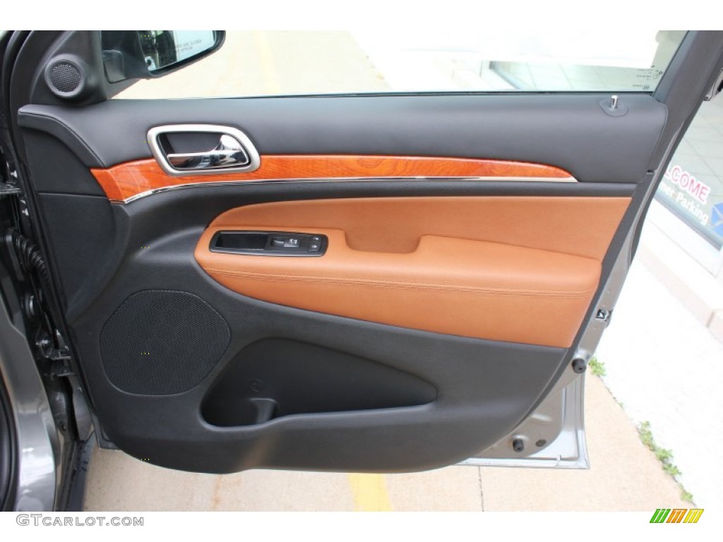 2011 Jeep Grand Cherokee Overland 4x4 New Saddle/Black Door Panel Photo #52340445