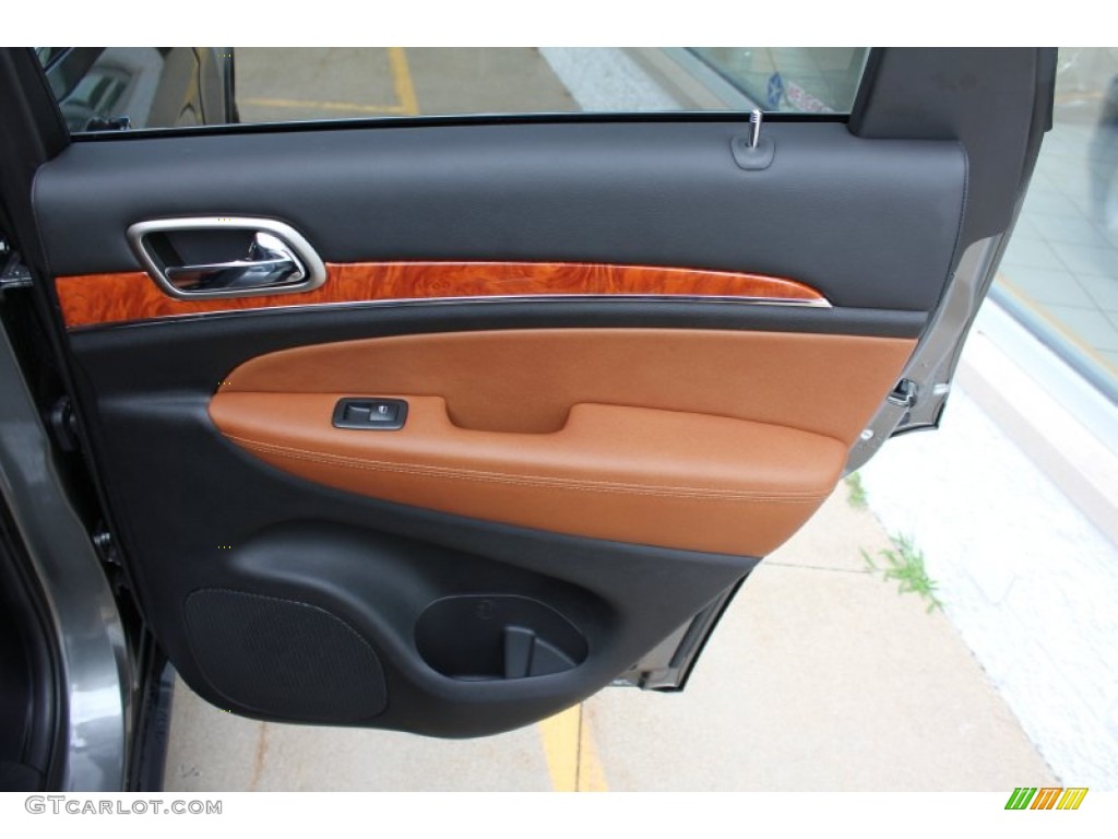 2011 Jeep Grand Cherokee Overland 4x4 New Saddle/Black Door Panel Photo #52340482