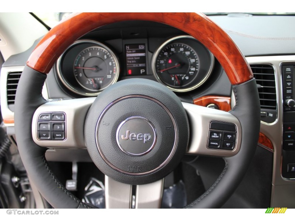 2011 Jeep Grand Cherokee Overland 4x4 New Saddle/Black Steering Wheel Photo #52340622