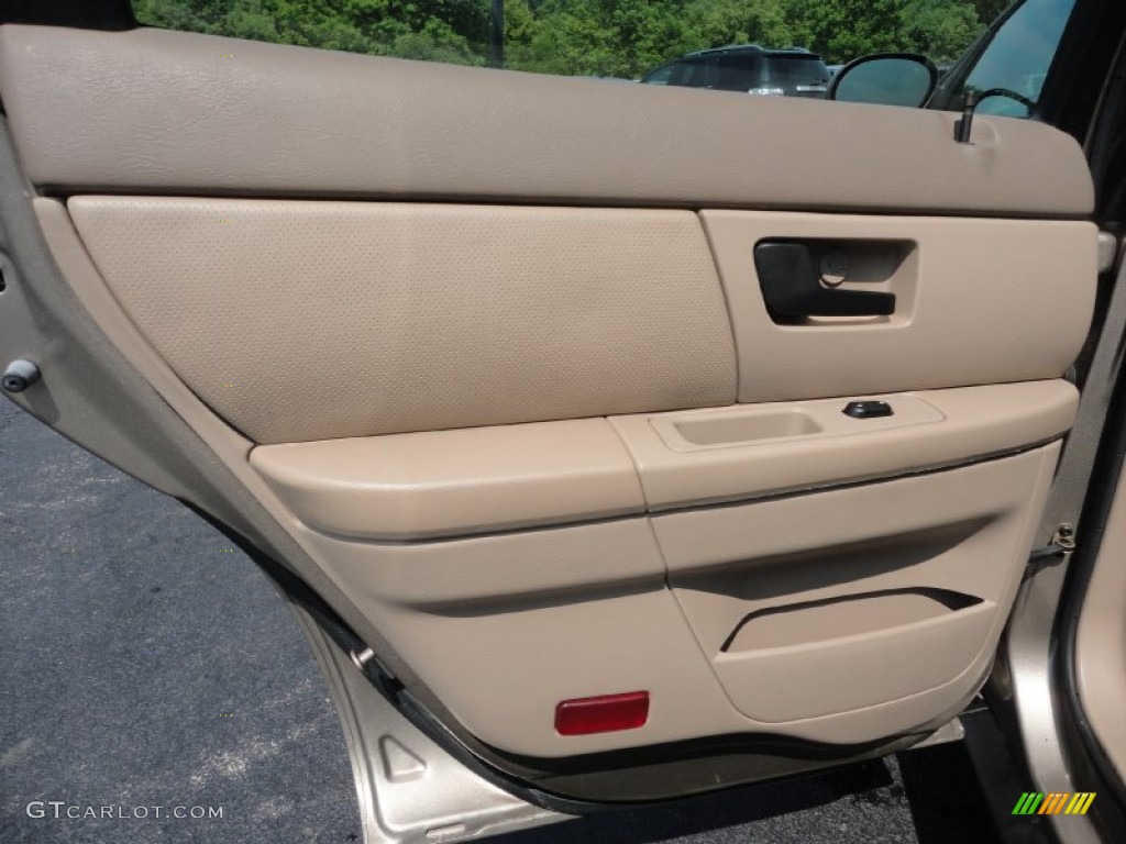 2004 Ford Taurus SES Sedan Medium Parchment Door Panel Photo #52346337