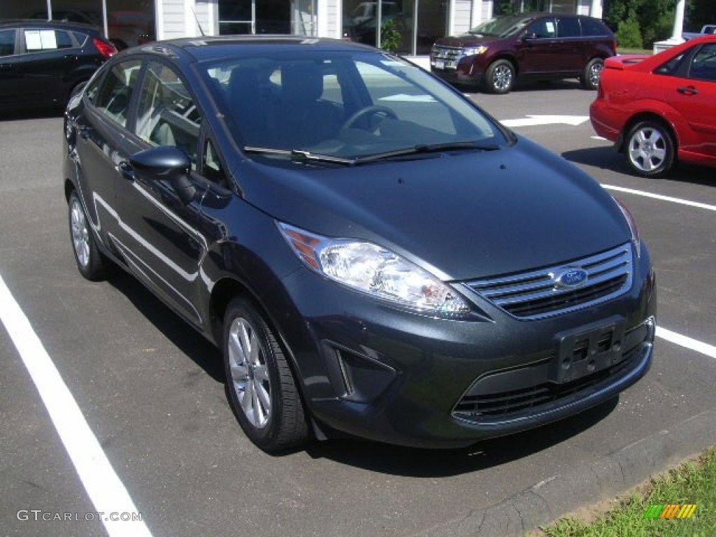 2011 Fiesta SE Sedan - Monterey Grey Metallic / Light Stone/Charcoal Black Cloth photo #1