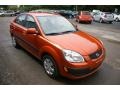 Sunset Orange 2009 Kia Rio LX Sedan Exterior