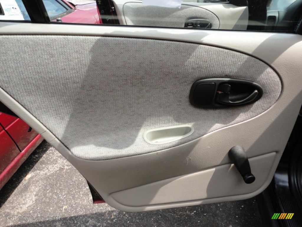 1999 Saturn S Series SL1 Sedan Tan Door Panel Photo #52400514